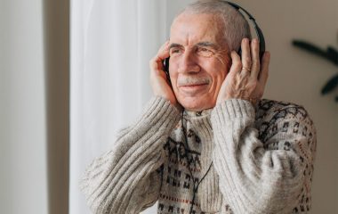 old man with headphone